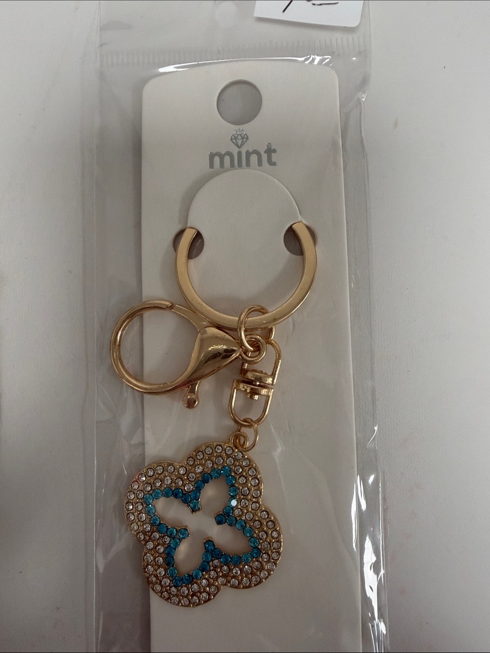 Mint Gold-Tone Keychain with Blue & White Clover Pendant